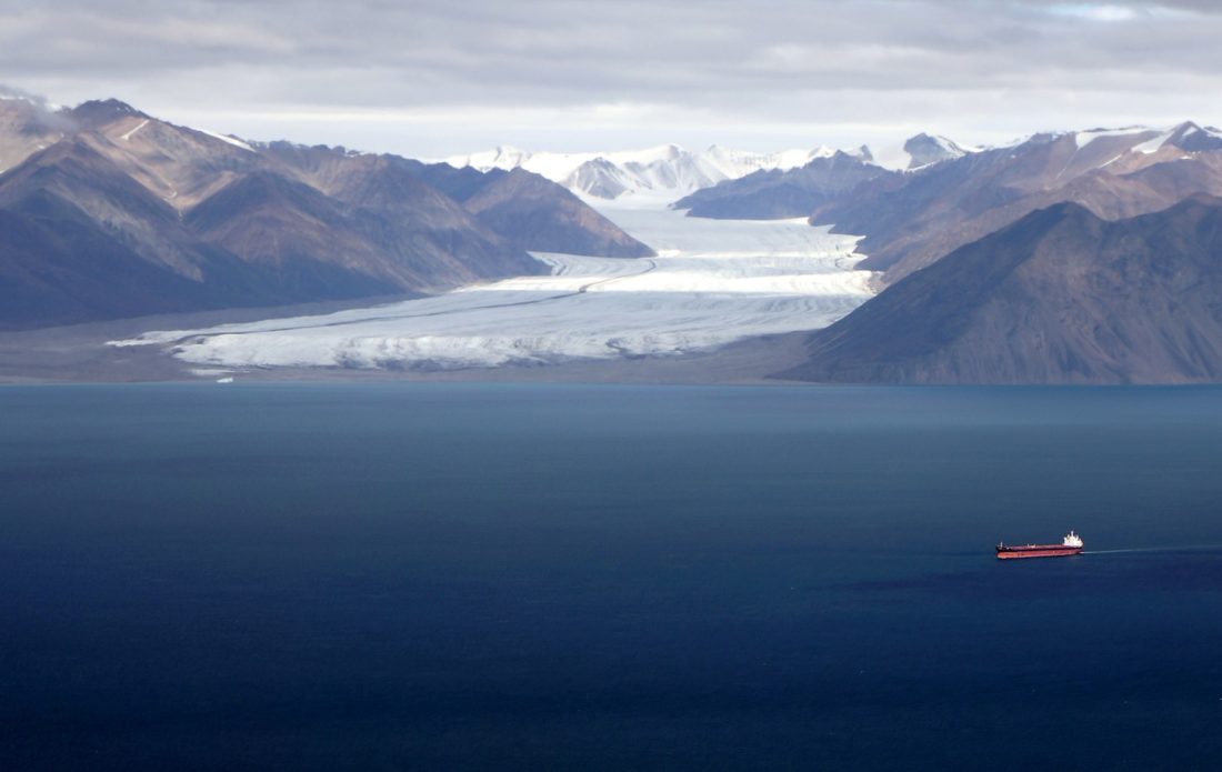 Receding glacier with tanker in foreground